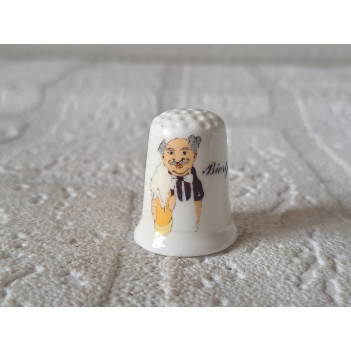 Tekening van een barman met de tekst Biertje vingerhoedje