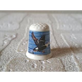 Eend aan het wegvliegen vingerhoedje Eend aan het wegvliegen vingerhoedje