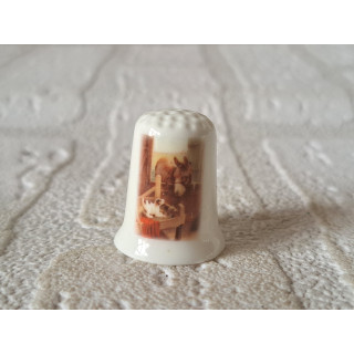 Ezel in schuur met hond vingerhoedje