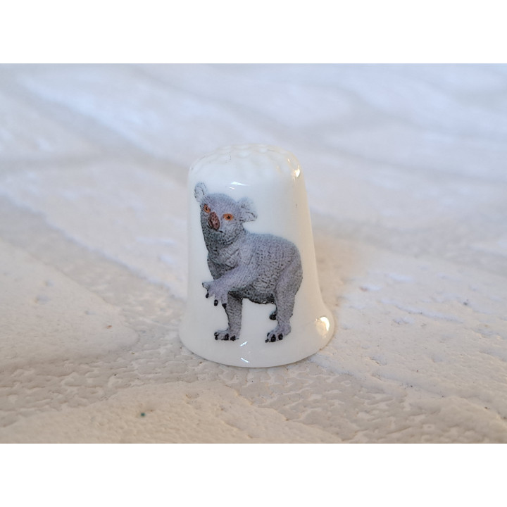 Koala beer met poot omhoog vingerhoedje