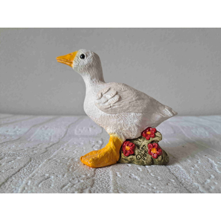 Gans met bloemen, aardewerk 11x5x10cm - dierfiguren