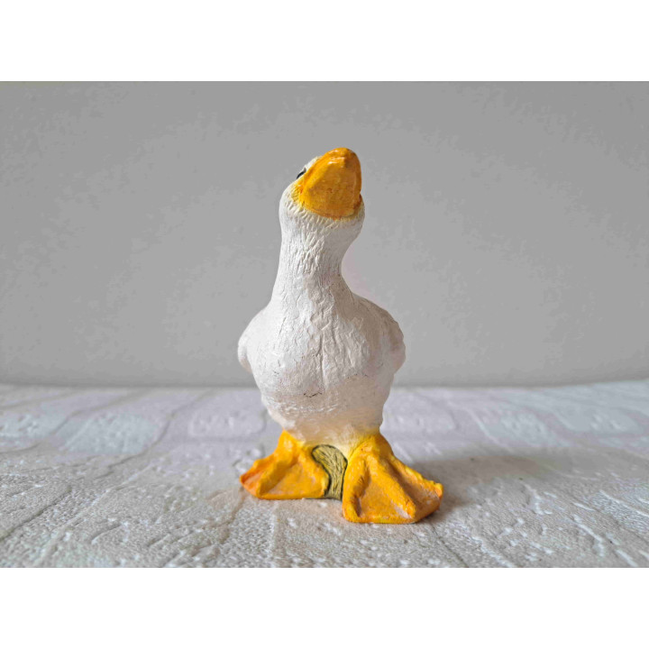 Gans met bloemen, aardewerk 11x5x10cm - dierfiguren