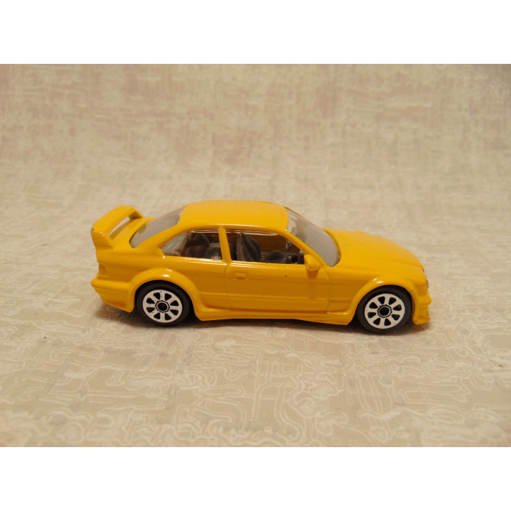 Bmw M3 coupe Bburago 1:43 geel