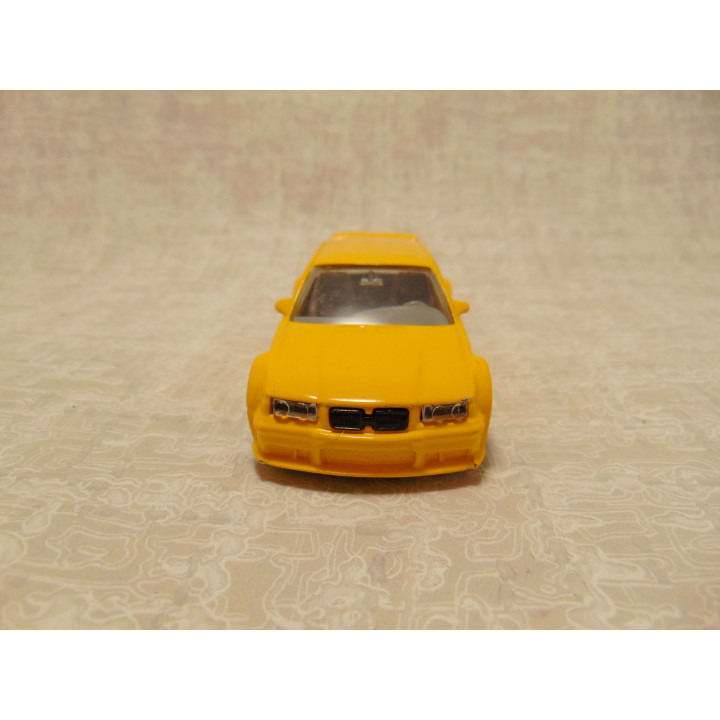 Bmw M3 coupe Bburago 1:43 geel