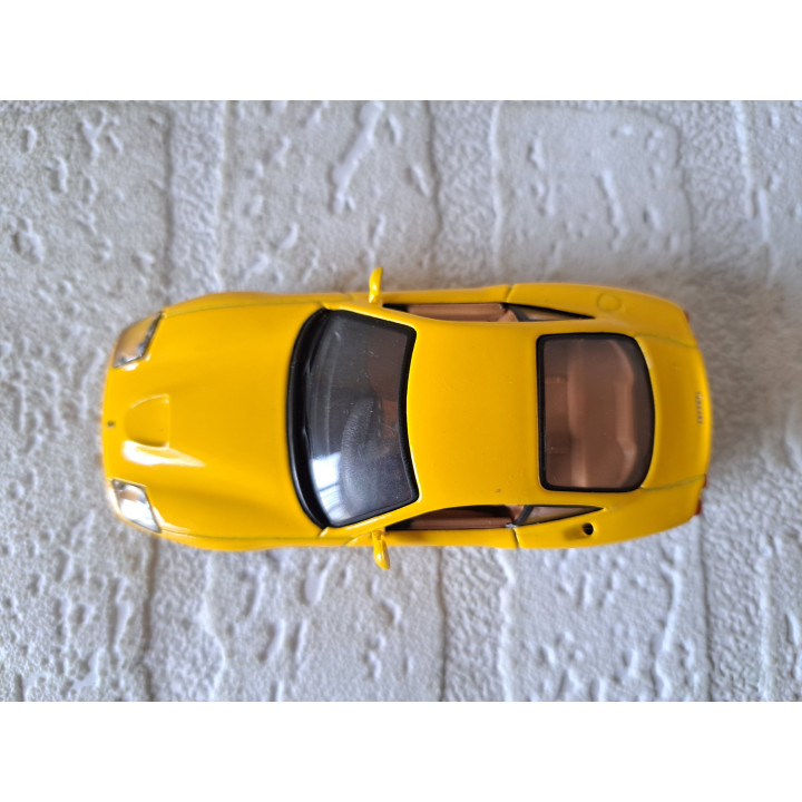 Ferrari 550 Maranello Maisto 1:43 geel - modelauto