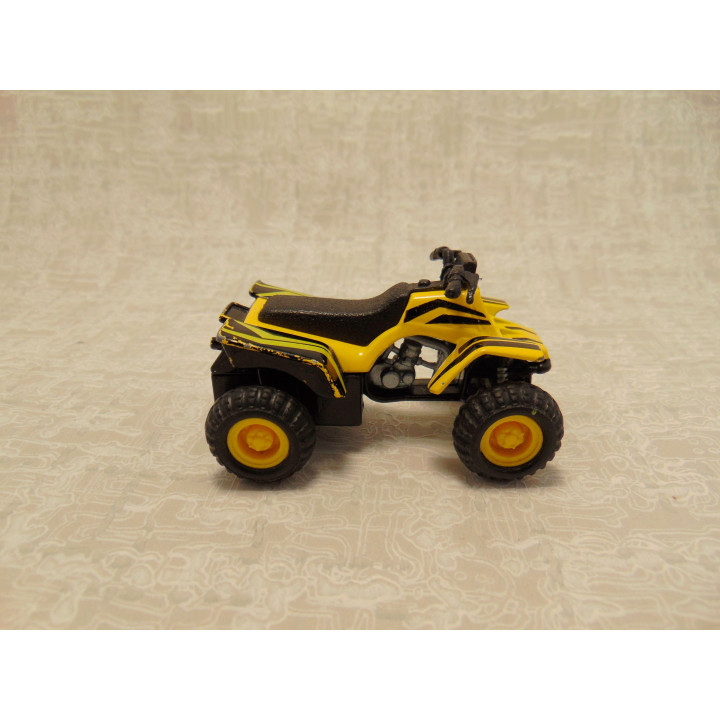 Quad ATV 4 wheeler Maisto geel