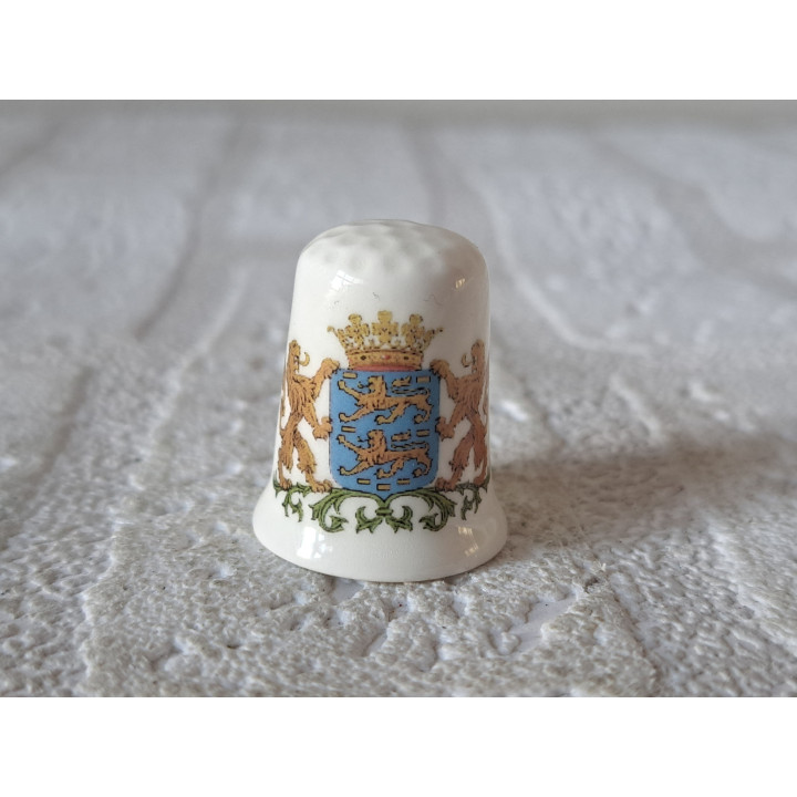 Porseleinen vingerhoedje met Nederlandse stadswapen van Friesland  - Verzamelobject
