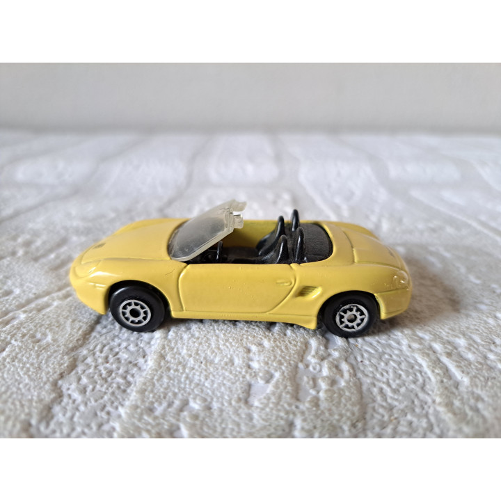 Porsche Boxster 1:64 Maisto geel - modelauto