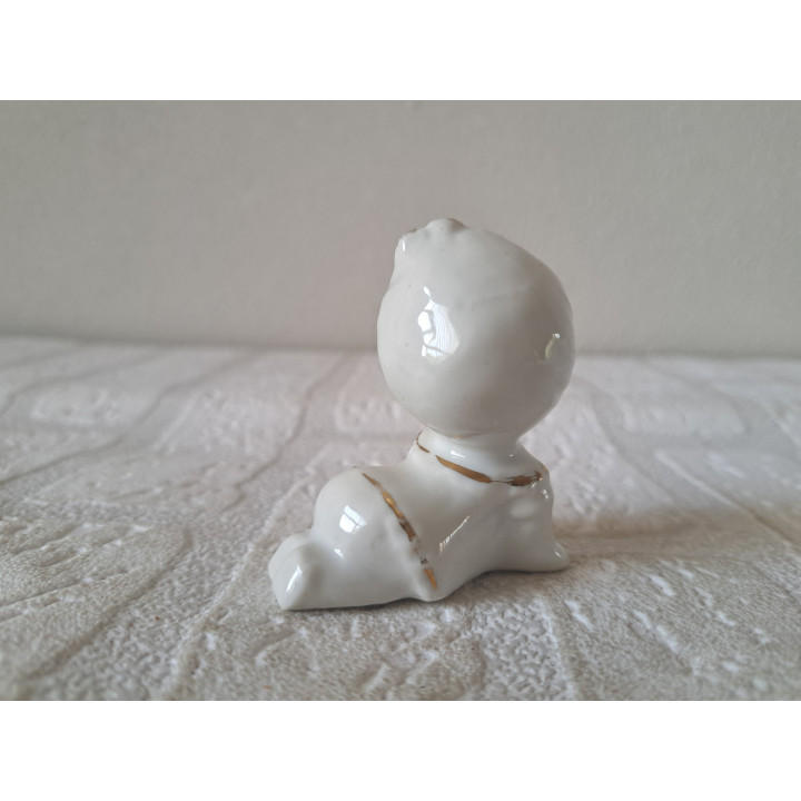 Meisje met strik in haar, porselein 5x3x6cm - beeldjes