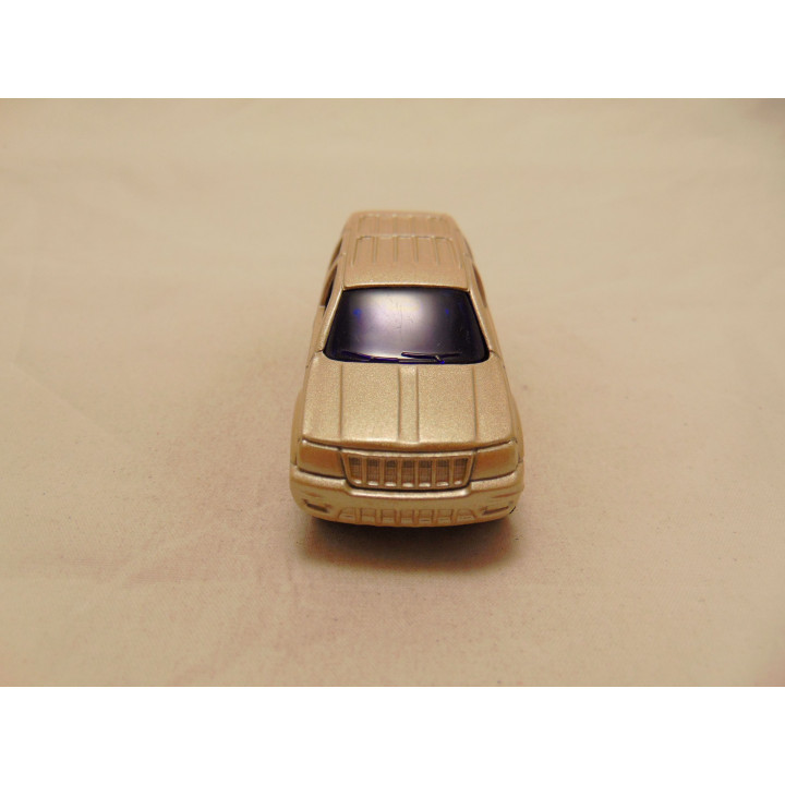 Jeep Grand Cherokee 2002 1:53 Maisto goudkleurig