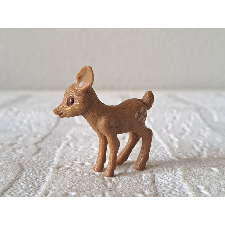 Reekalfje, MEG 1996, rubber 4x1.5x4cm - dierfiguren