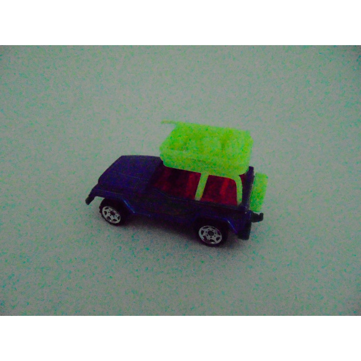 Jeep Wrangler 1998 1:56 Matchbox fluoriserend  - modelauto