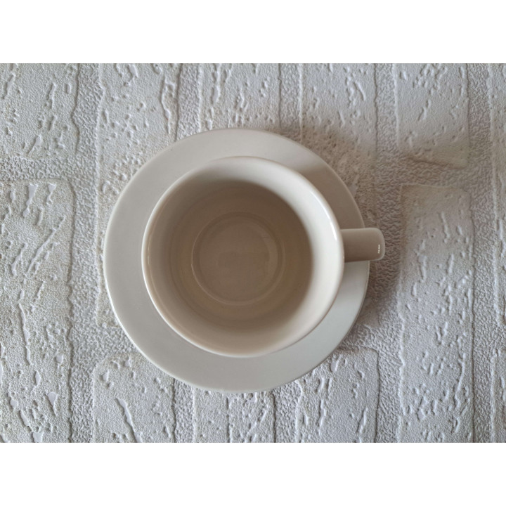 Kop en schotel met Macmillan fiets, porselein D13xH8cm - handgemaakt