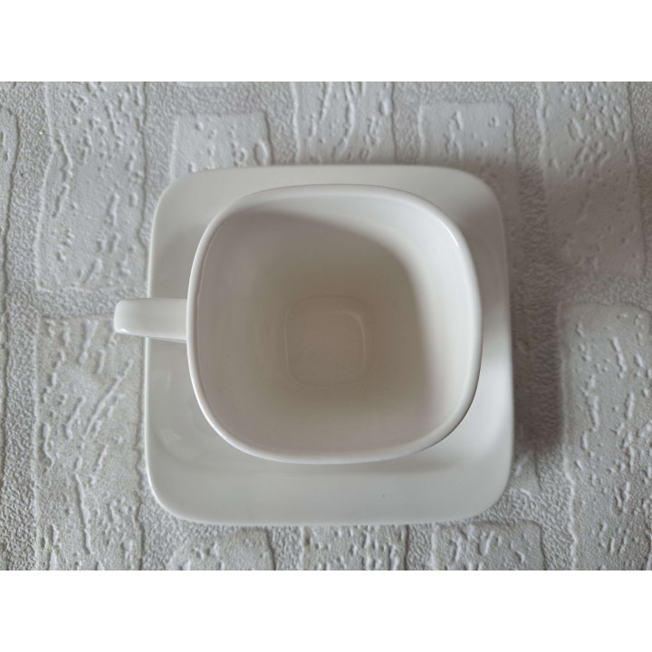 Kop en schotel met clown en varken, porselein 14x14x8.5cm - handgemaakt