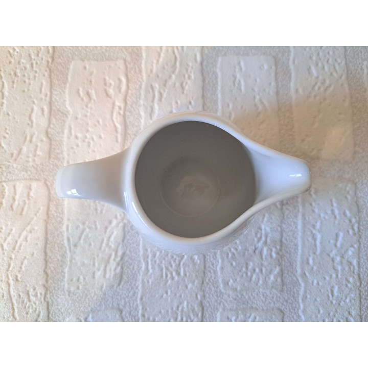 Melkkan met Pinguin, porselein 11x7.5x8cm - handgemaakt