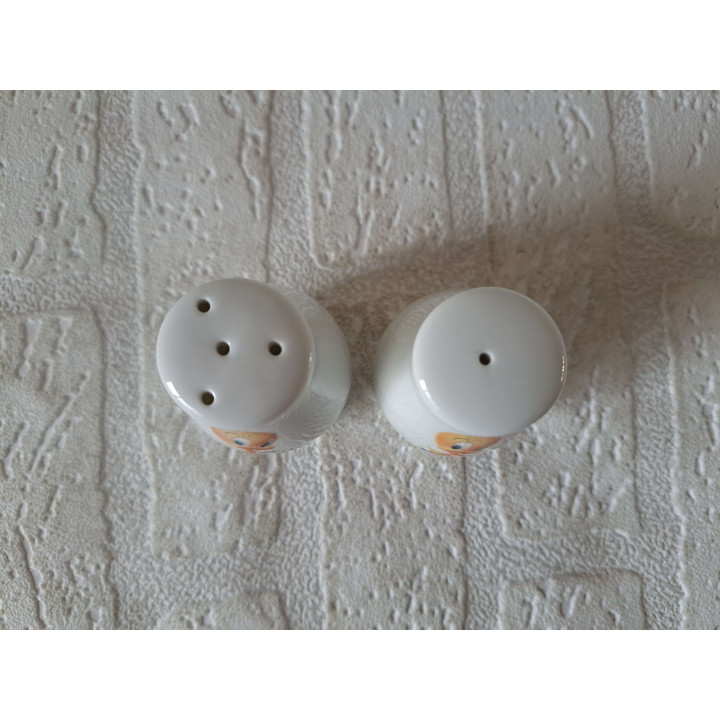 Tweety Solex bromfiets peper en zoutstel, porselein D4xH6cm - peper en zoutstellen