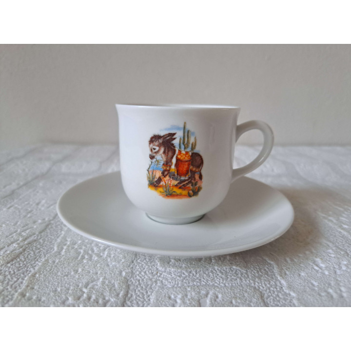 Kop en schotel Ezel met mand porselein D13.5x7.5cm - handgemaakt