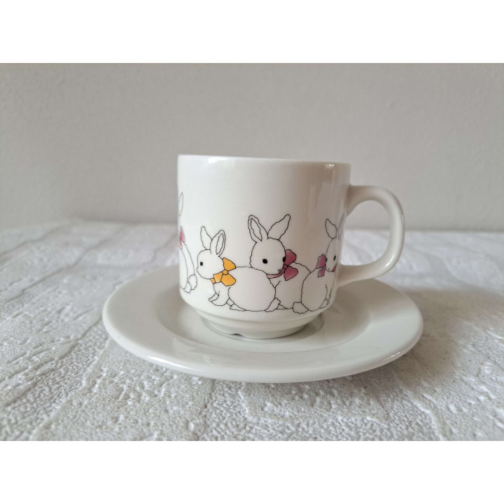 Kop en schotel met Ezel met mand, porselein D14x7.5cm - handgemaakt