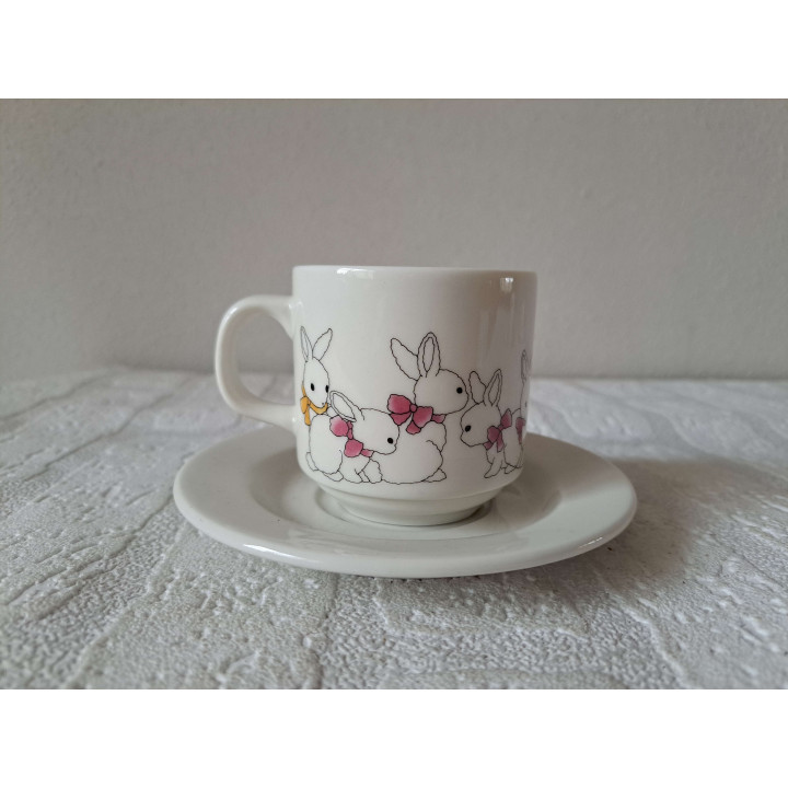 Kop en schotel met Ezel met mand, porselein D14x7.5cm - handgemaakt