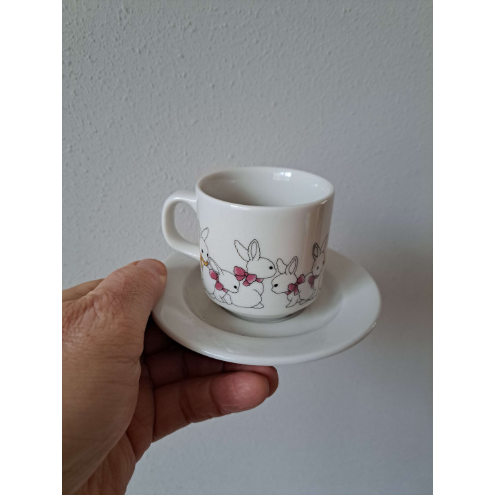 Kop en schotel met Ezel met mand, porselein D14x7.5cm - handgemaakt