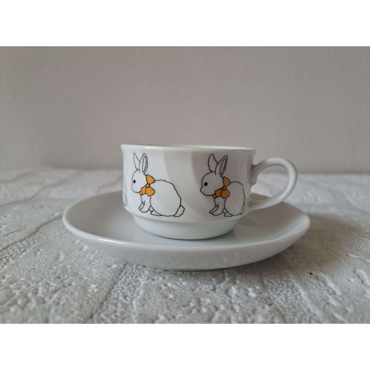 Kop en schotel met Konijnen, porselein D11.5x4.5cm - handgemaakt