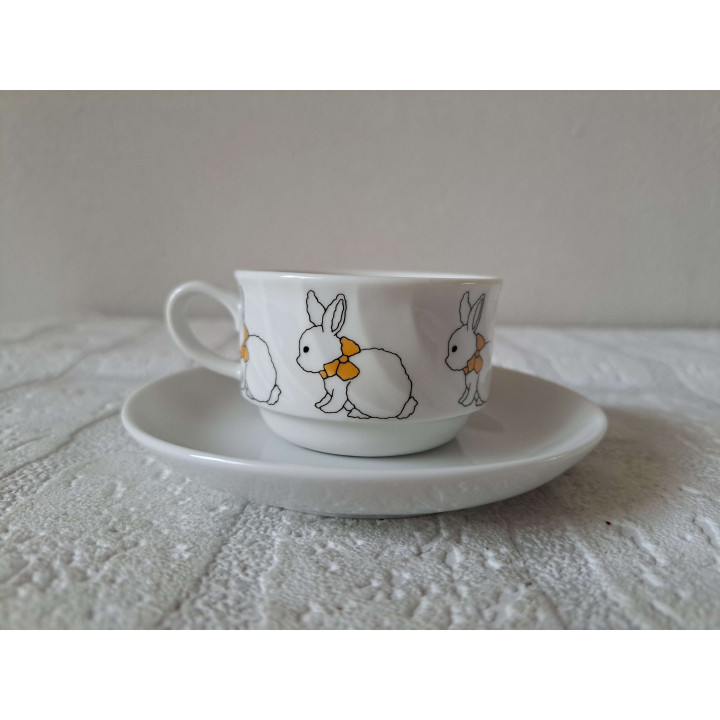 Kop en schotel met Konijnen, porselein D11.5x4.5cm - handgemaakt