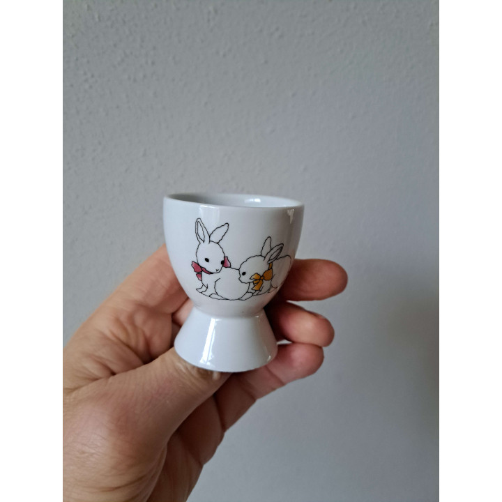 Eierdopje met konijnen, porselein D5xH6cm - handgemaakt
