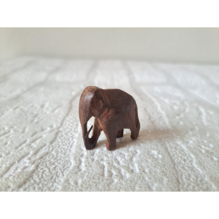 Hand-Carved Wooden Elephant Figurine 2.5x1.5x2.5cm