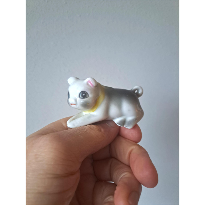 Liggend varken, porselein 7.5x4.5x4cm