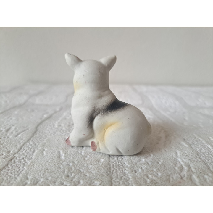Zittend varken, porselein 5.5x3.5x5.5cm - dierfiguren