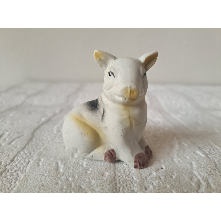 Zittend varken, porselein 5.5x3.5x5.5cm - dierfiguren