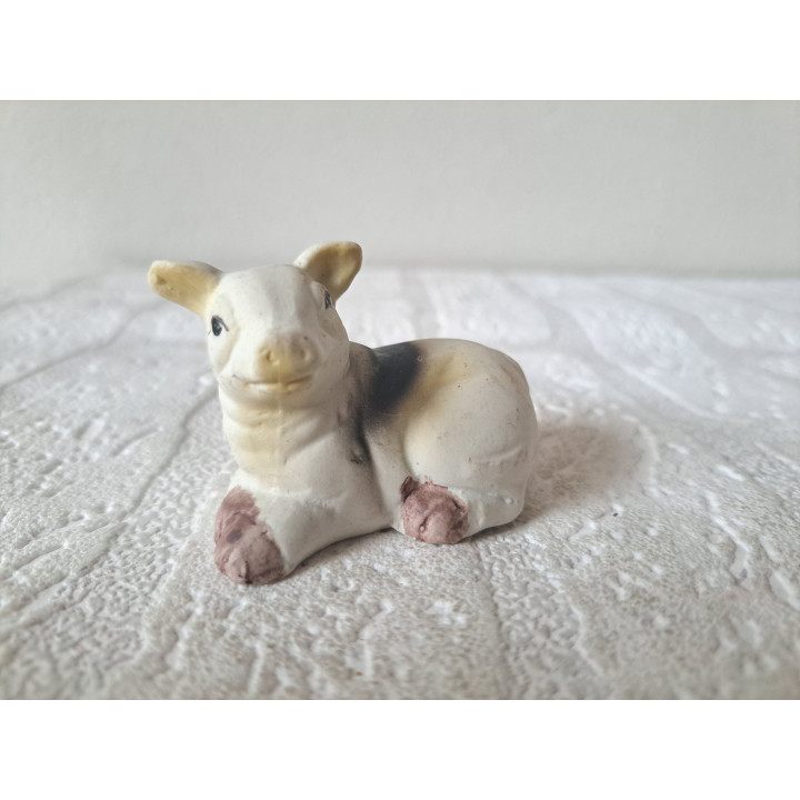 Liggend varken, kop opzij, porseleinen 6x3.5x4.5cm - dierfiguren