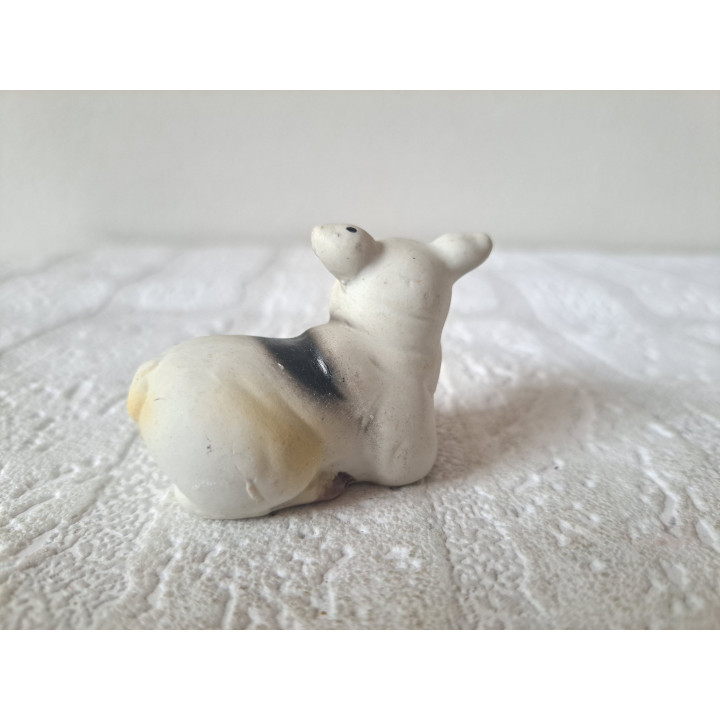 Liggend varken, kop opzij, porseleinen 6x3.5x4.5cm - dierfiguren