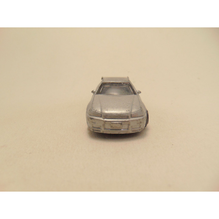 Nissan Skyline GT R 1:64 zilverkleurig
