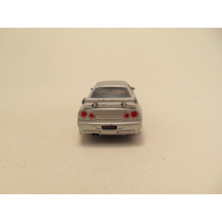 Nissan Skyline GT R 1:64 zilverkleurig