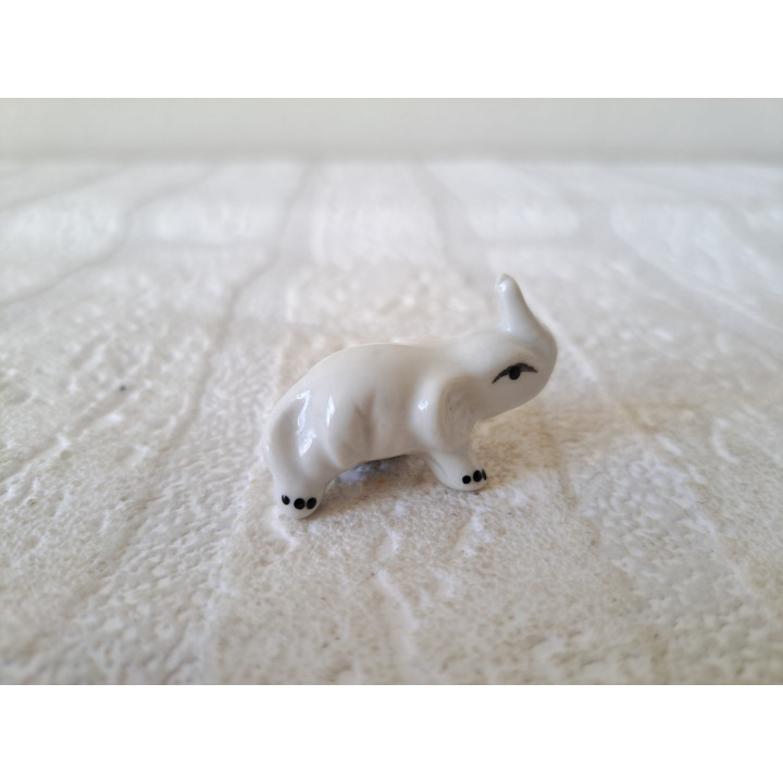 Mini olifant, porseleinen 4x1.5x2.5cm - Verzamelobjecten