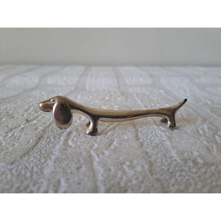 Teckel messensteun hond, 8.5x1.5x2cm - dierfiguren