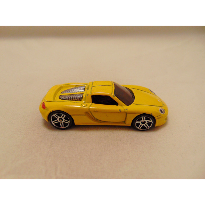 Porsche Carrera GT Hot wheels 2009-010 geel