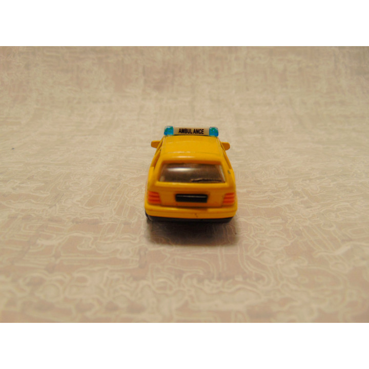 Bmw 325i Touring station ambulance Cararama-Hongwell 1:72 geel