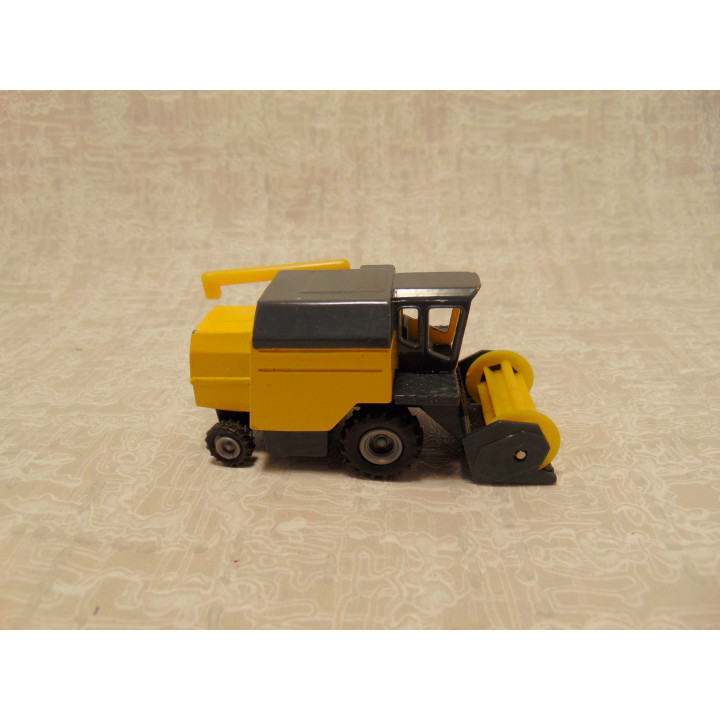 Dorsmachine 1:55 1024 landbouwvoertuig Siku geel