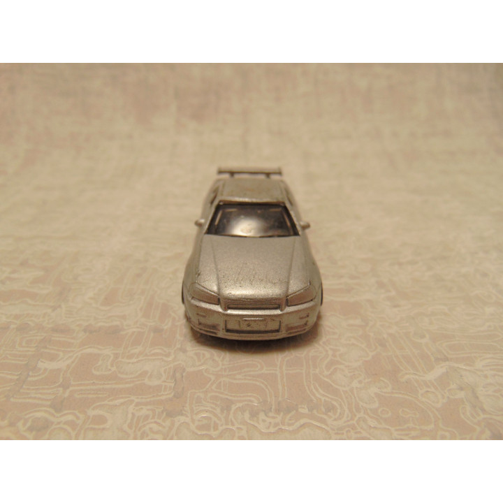 Nissan Skyline GT R coupe 1:64 zilverkleurig