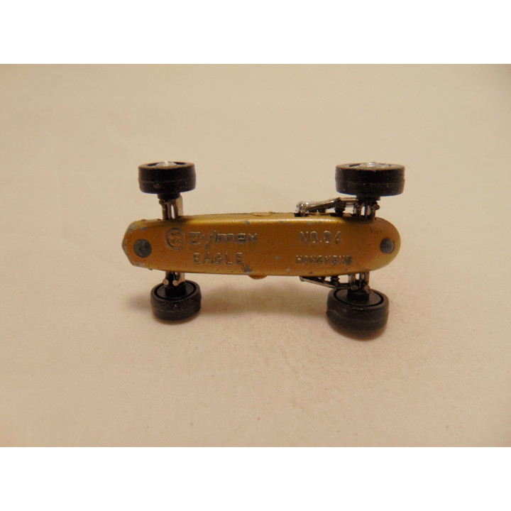 Eagle MK1 T1G formule 1 1:64 Zylmax goudkleurig