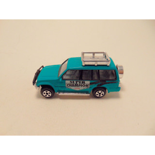 Mitsubishi Pajero Super champion 1:64 groenblauw