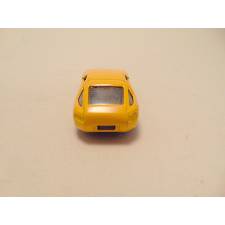 Porsche 928 1:64 Welly geel